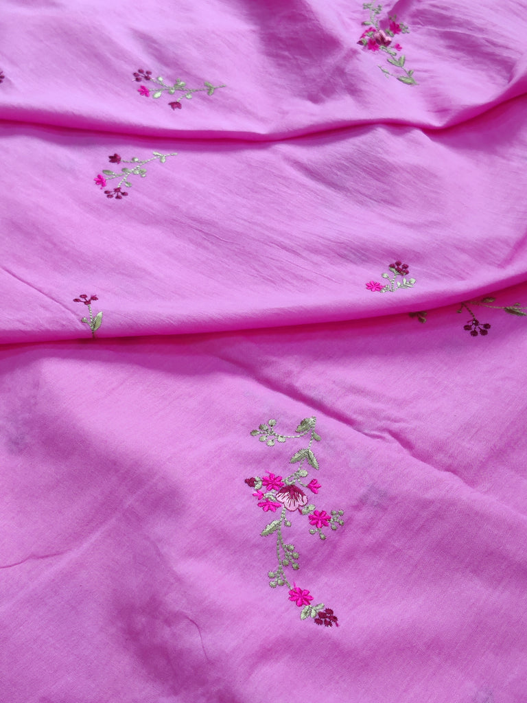 Pink fabric with floral embroidery