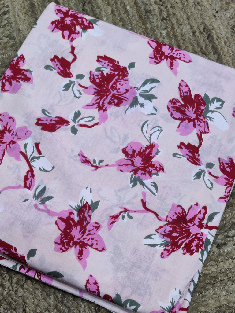 Floral fabric with pink flowers on a light background