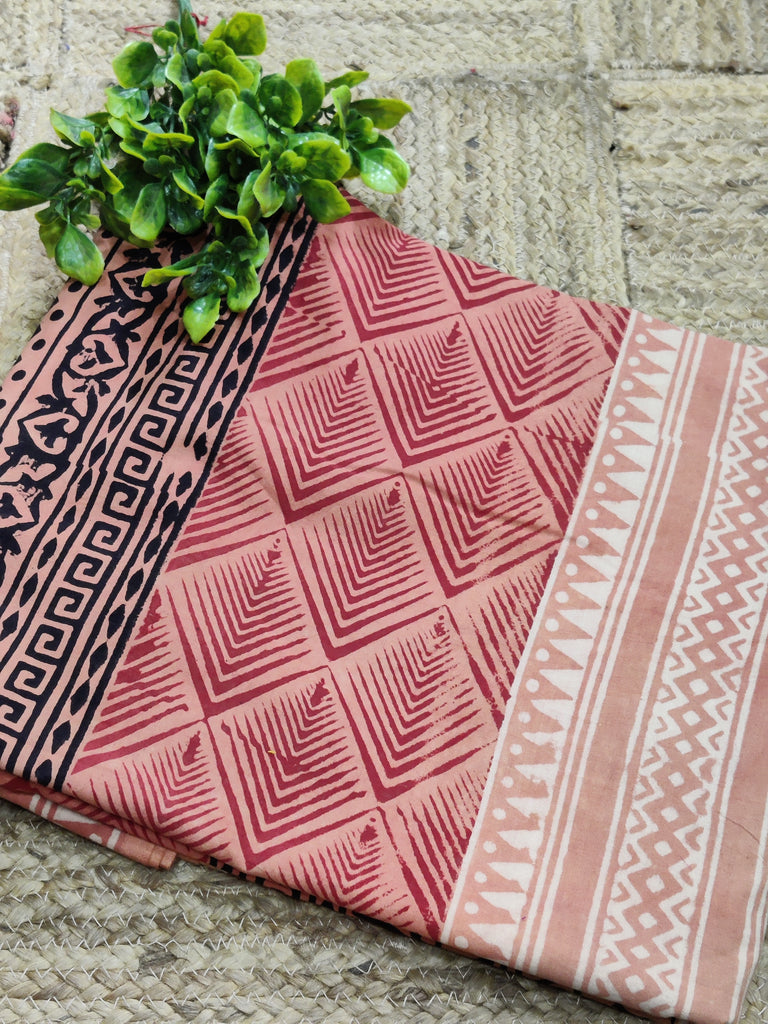 Textile with geometric patterns on a stone surface