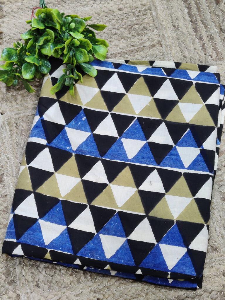 Folded fabric with geometric pattern on a textured surface